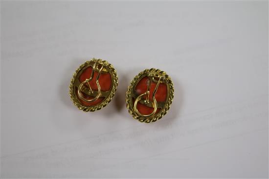 A pair of yellow metal and fluted coral oval earrings, 24mm.